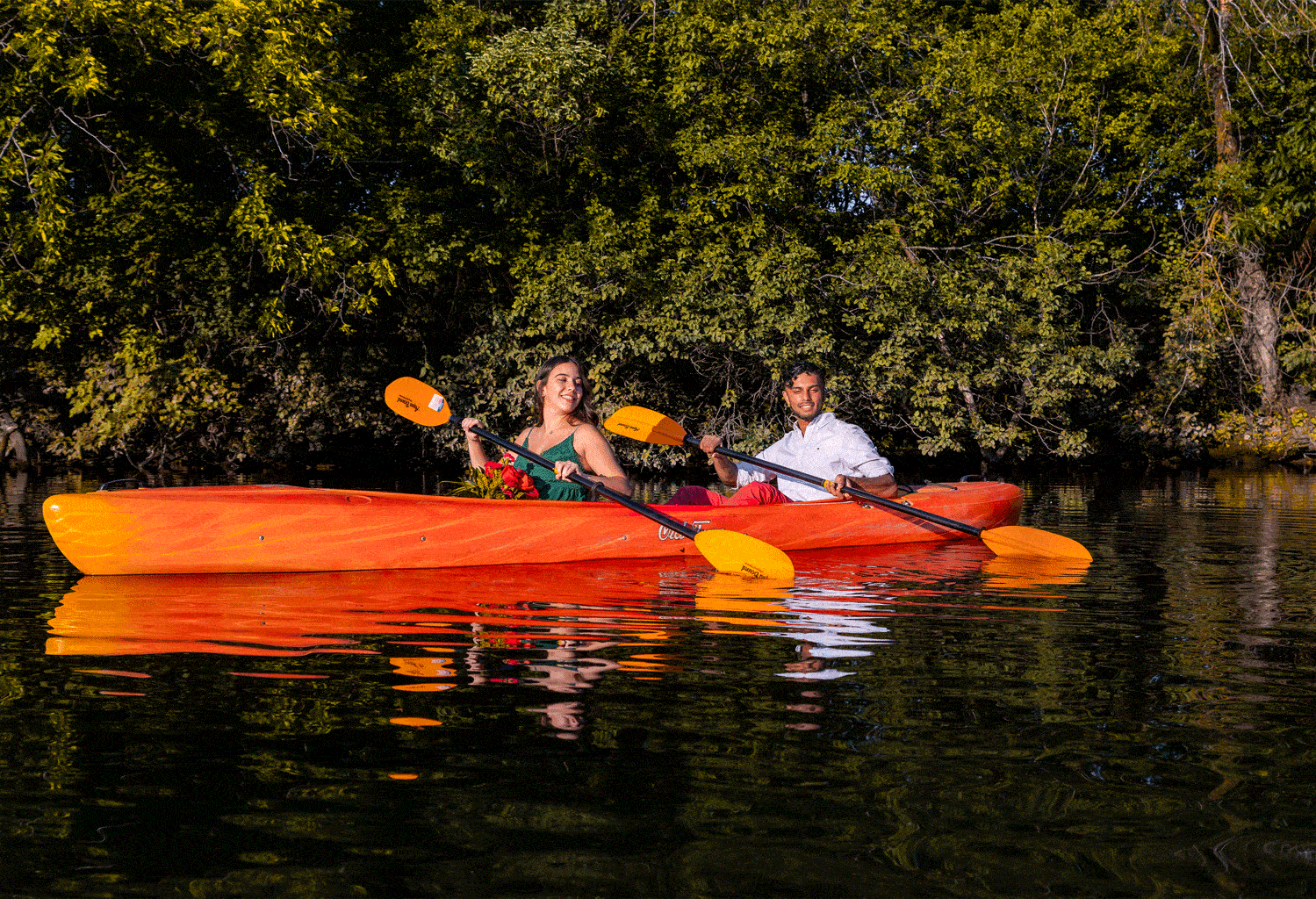 Bride and Groom kayaking at Chicago on their wedding day.